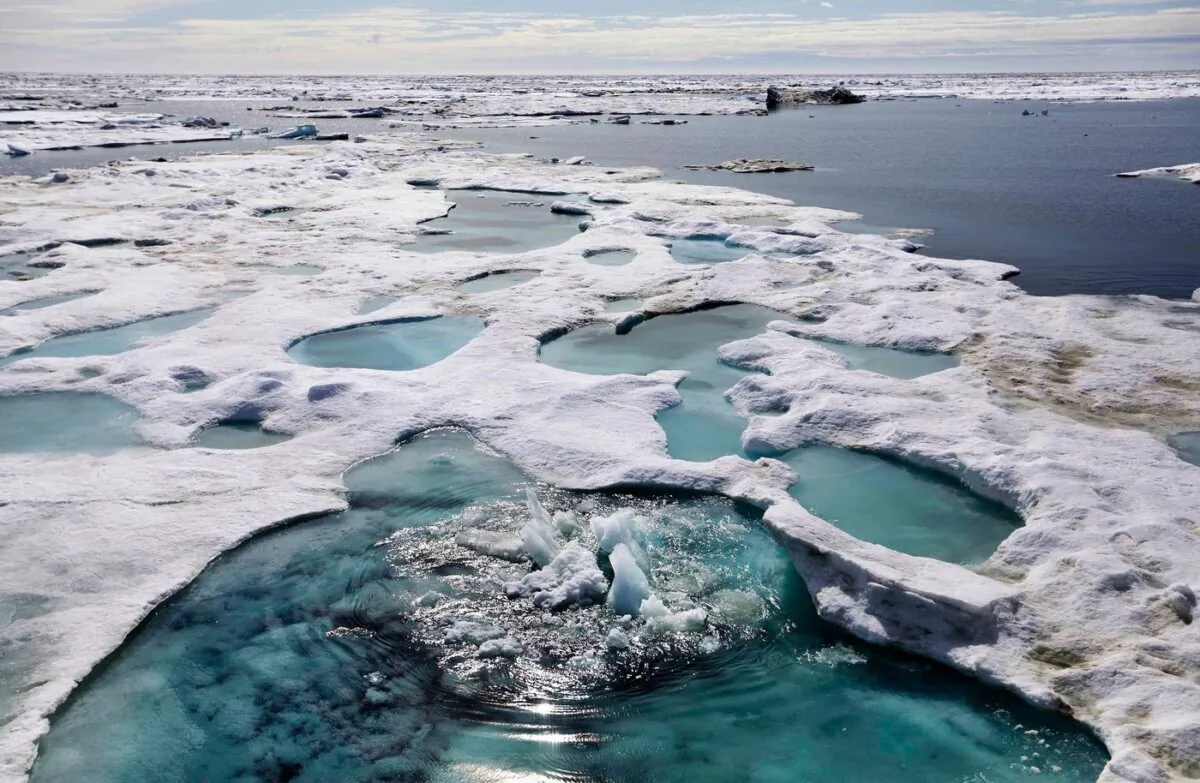 Ice is broken up by the passing of the Finnish icebreaker MSV Nordica as it sails through the Beaufort Sea off the coast of Alaska in a file photo on July 16, 2017. (The Canadian Press/AP/David Goldman)