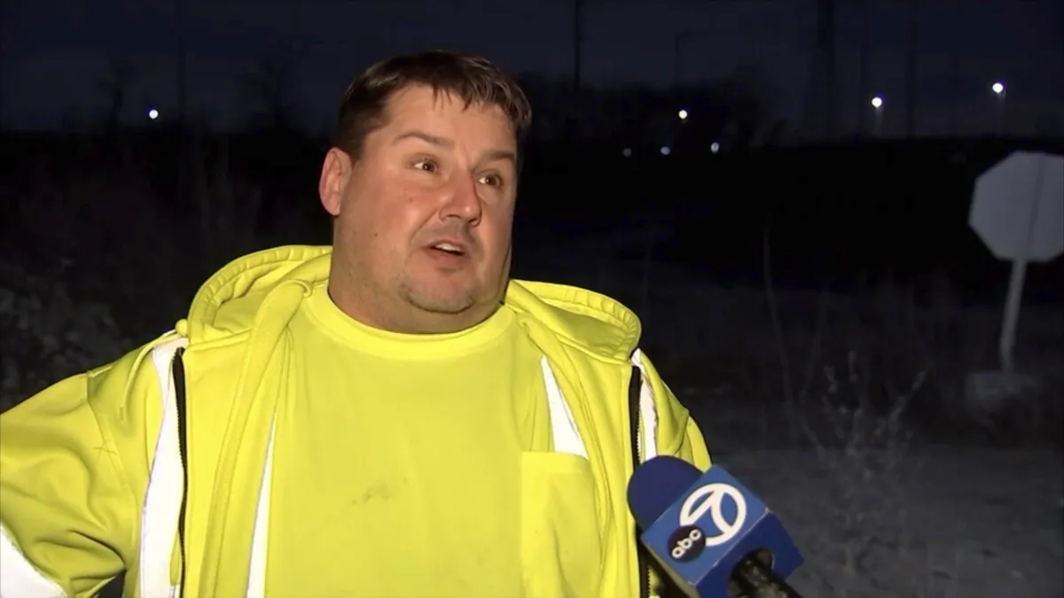 Greg Zellers near the area in Gary, Ind., on Jan. 1, 2024, where a car flipped early New Year’s Day on a little-used road. (ABC7 Chicago via AP)