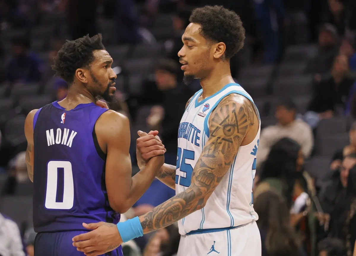 Sacramento Kings guard Malik Monk (0) and Charlotte Hornets forward P.J. Washington Jr. (25) shake hands after the game at Golden 1 Center in Sacramento, Calif., on Jan 2, 2024. (Kelley L Cox/USA TODAY Sports via Field Level Media)