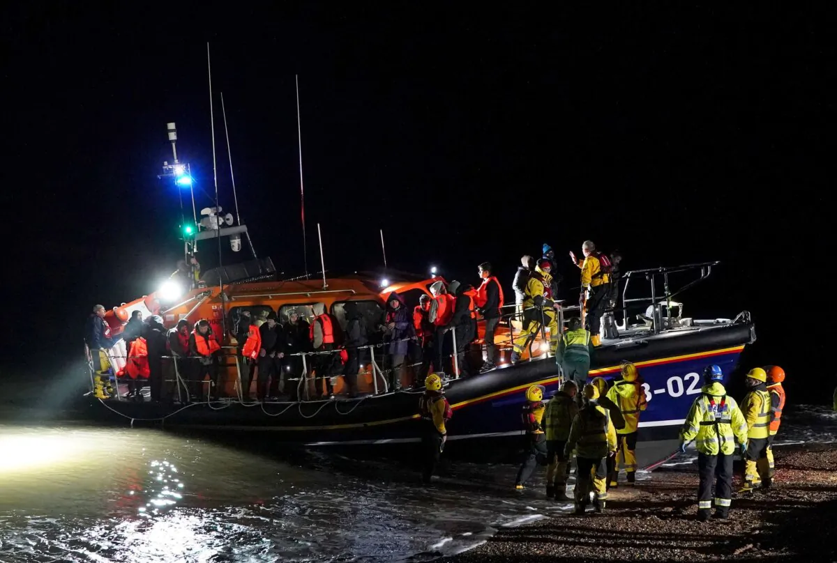 Undated file photo showing people thought to be illegal immigrants. (Gareth Fuller/PA)
