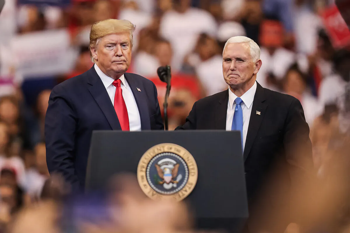 President Donald Trump and Vice President Mike Pence during a campaign rally in Sunrise, Fla., on Nov. 26, 2019. (Joe Raedle/Getty Images