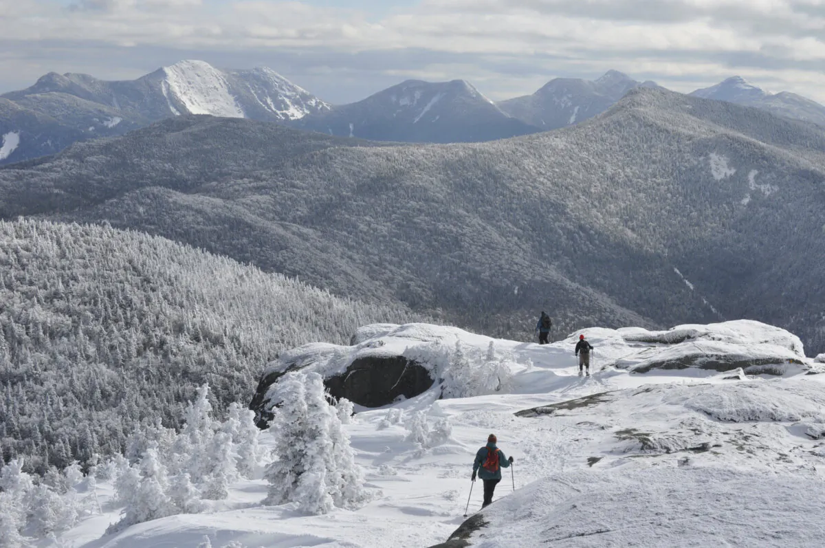 Three snowshoers descend from the summit of Cascade Mountain in the Adirondacks on March 14, 2011. (Mike Lynch/Adirondack Daily Enterprise via AP)