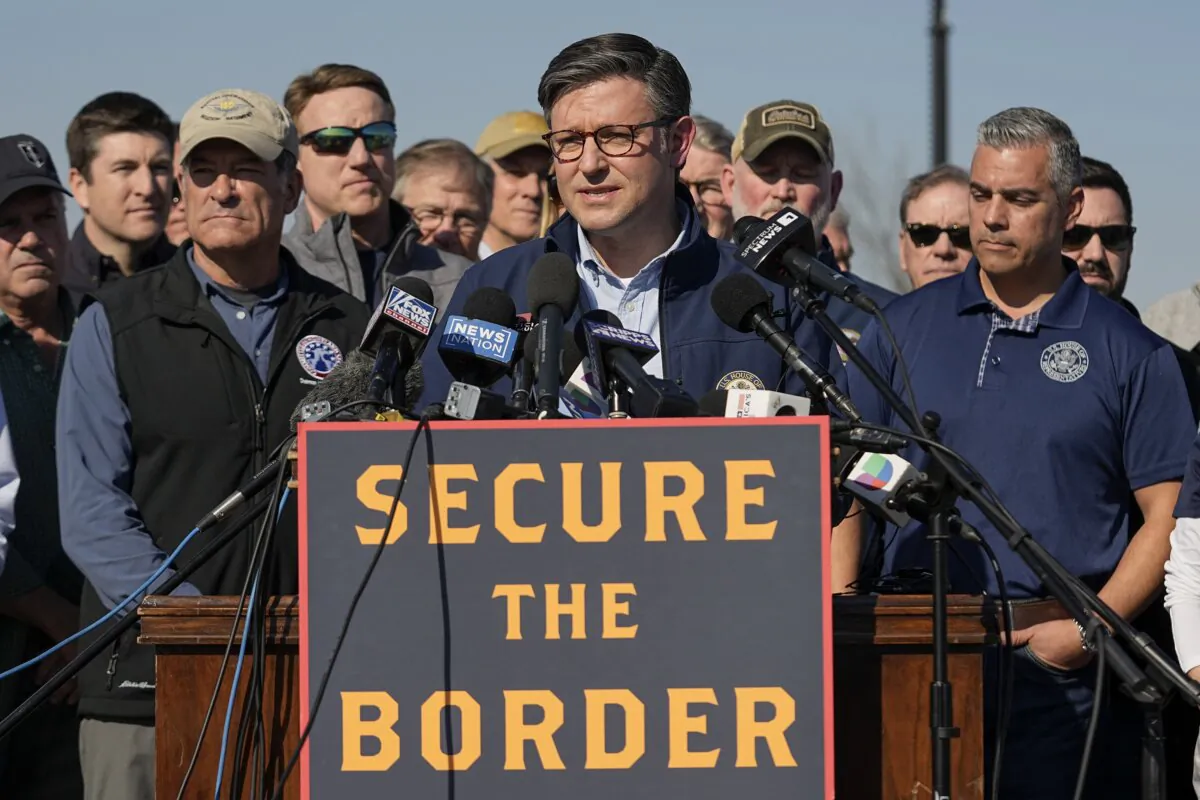 House Speaker Mike Johnson speaks while standing with Republican members of Congress in Eagle Pass, Texas, on Jan. 3, 2024. (Eric Gay/AP Photo)