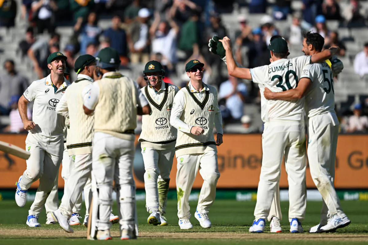 Steve Smith of Australia (C) celebrates with teammates after catching out Mir Hamza of Pakistan off a delivery from Mitchell Starc of Australia to defeat Pakistan in the Second Test match between Australia and Pakistan at the Melbourne Cricket Ground (MCG) in Melbourne, Australia on Dec. 29, 2023. (AAP Image/James Ross)