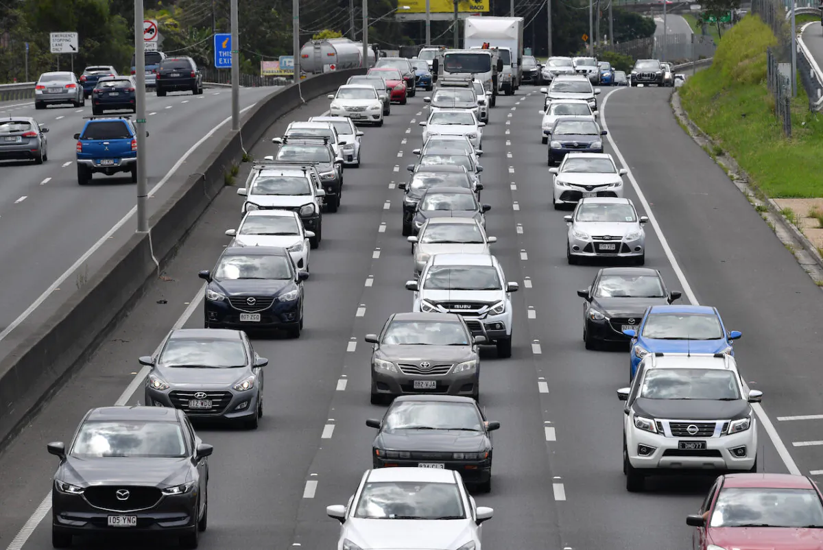 Traffic is seen leaving Brisbane and heading south towards the Gold Coast on the Pacific Motorway (M1) at Tanah Merah in Logan City, Queensland, Australia on Oct. 29, 2021. (AAP Image/Darren England)