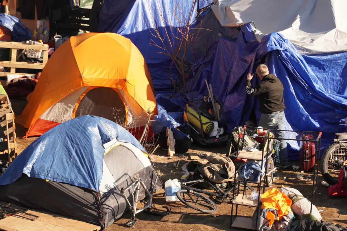 A homeless encampment in Harbor View Memorial Park in Portland, Maine, on Dec. 16, 2023 before the city ordered the campsite dismantled and its inhabitants moved into a city-run shelter. (Allan Stein/The Epoch Times)