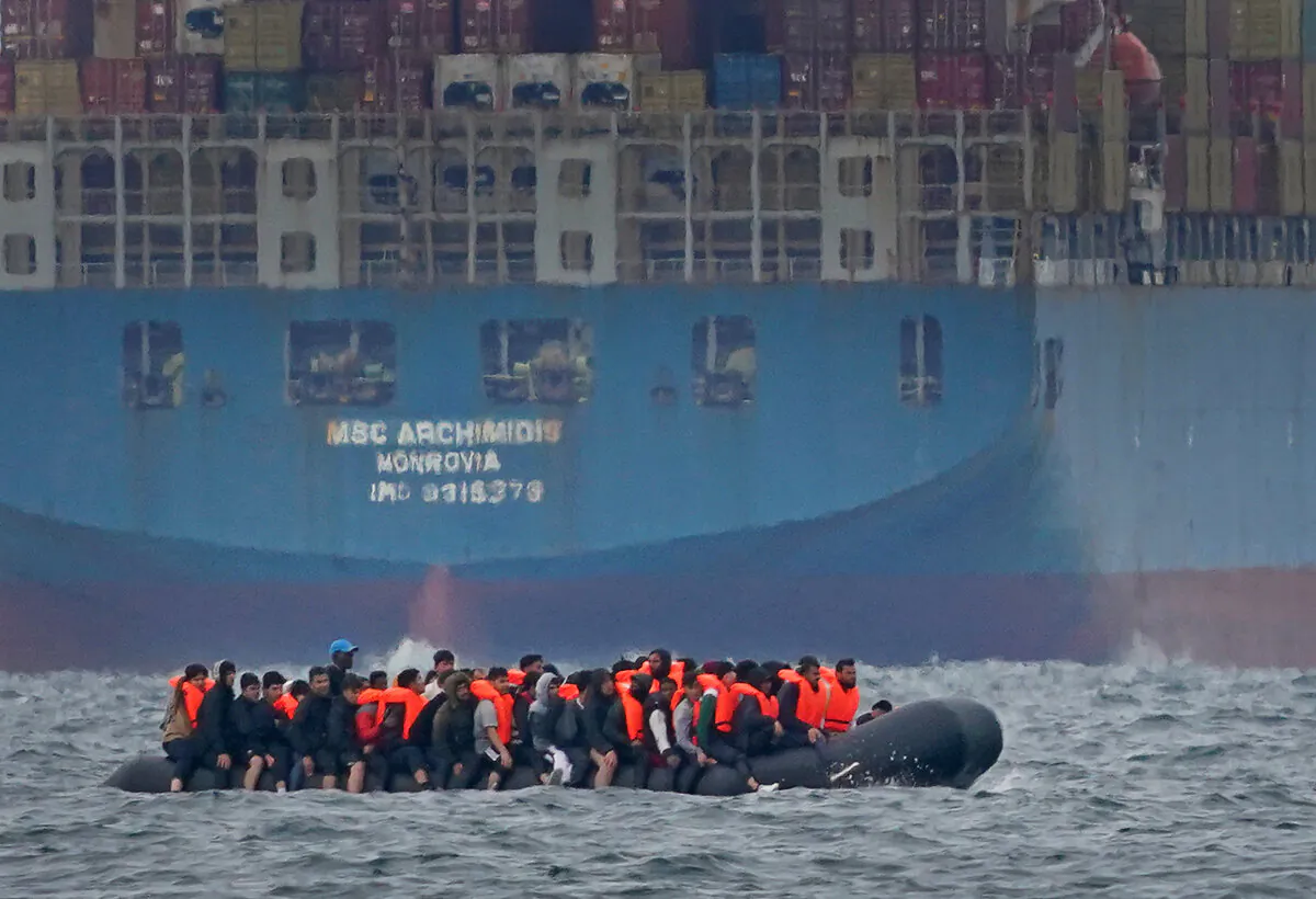 Illegal immigrants crossing the in a small boat traveling from France  off the coast of Dover, England, on Aug. 29, 2023. (Gareth Fuller/PA)