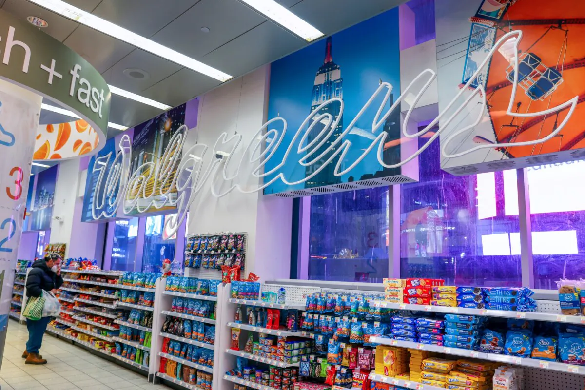 A person shops in a Walgreens store in Manhattan, New York, on Nov. 26, 2021. (Andrew Kelly/Reuters)