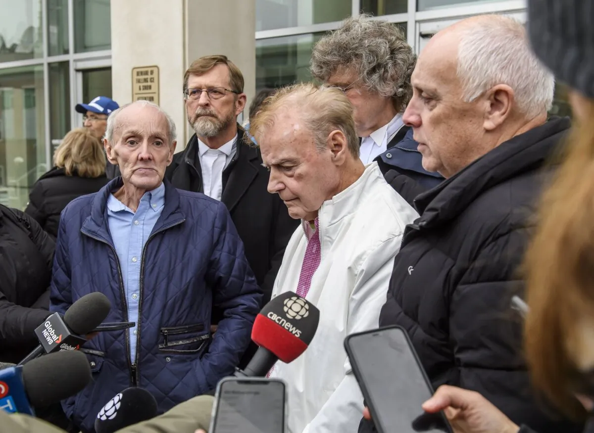 Robert Mailman (L) and Walter Gillespie, speak to media shortly after their hearing at Saint John Law Courts in Saint John, N.B., on Jan. 4, 2024. (The Canadian Press/Michael Hawkins)