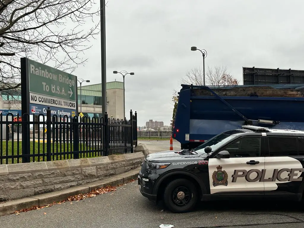 A Canadian police car is seen near the Rainbow Bridge border crossing into the United States in Niagara Falls, Ont., on Nov. 22, 2023. (Usman Khan/AFP via Getty Images)