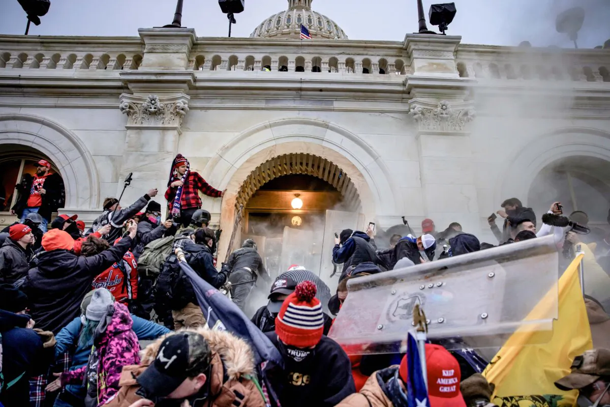 Protesters clash with police and security forces at the Capitol in Washington on Jan. 6, 2021. (Brent Stirton/Getty Images)