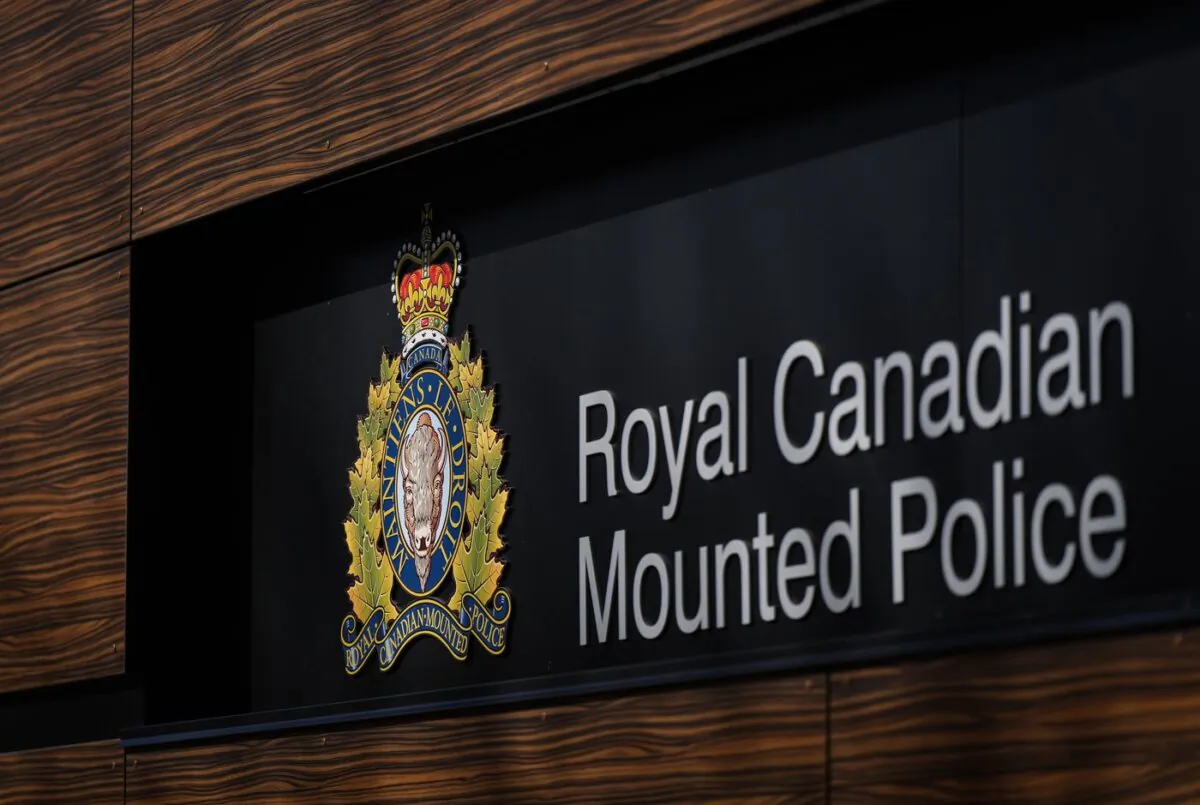 The RCMP logo is seen outside the force's 'E' division headquarters in Surrey, B.C., on Mar. 16, 2023. (The Canadian Press/Darryl Dyck)