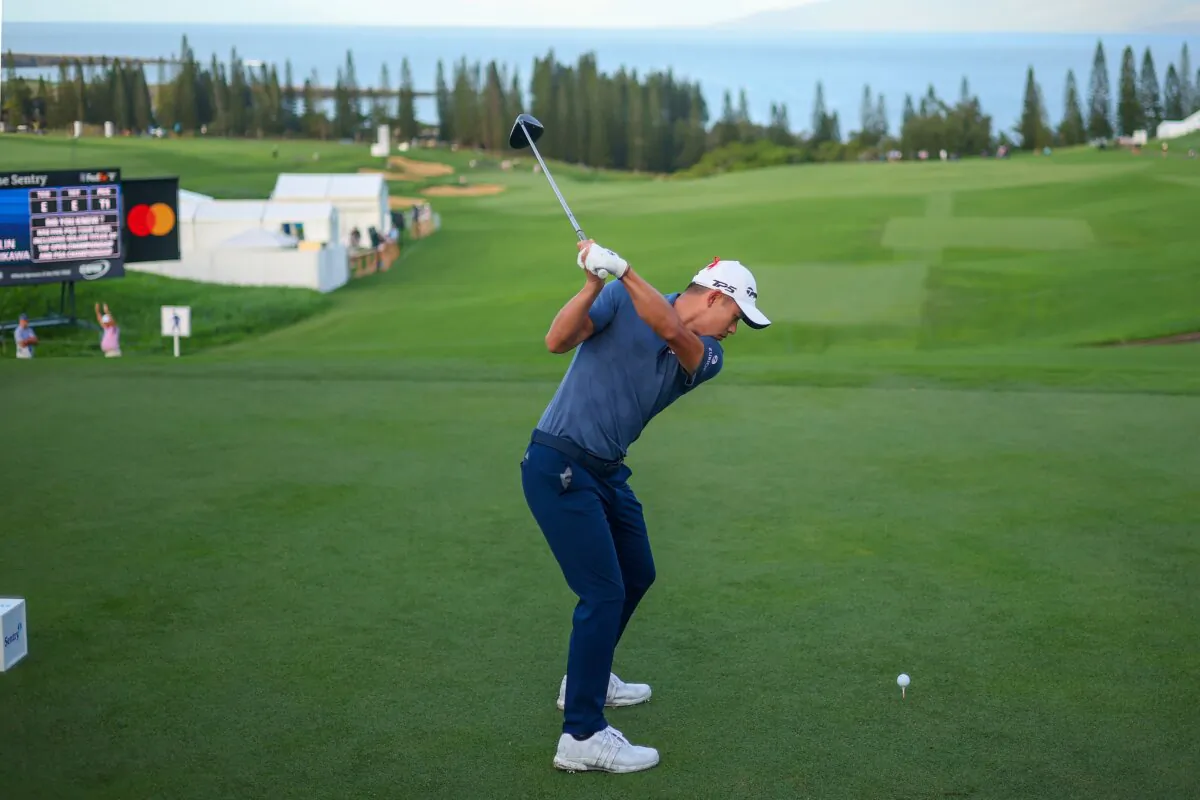 Collin Morikawa of the United States plays his shot from the first tee during the first round of The Sentry at Plantation Course at Kapalua Golf Club in Kapalua, Hawaii, on Jan. 4, 2024. (Michael Reaves/Getty Images)