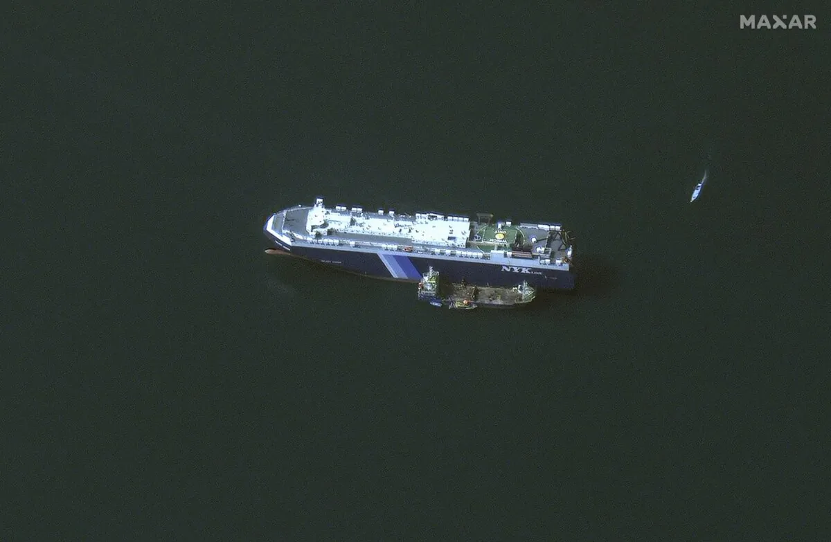 This satellite image provided by Maxar Technologies shows the Galaxy Leader ship anchored offshore of As Salif, Yemen, on Nov. 28, 2023. (The Canadian Press/AP-HO, Maxar Technologies, Satellite image ©2023)