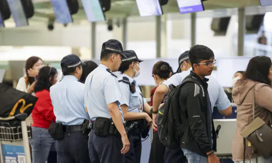Hong Kong Man in Court on Charges Related to Slogan on Apparel at Airport