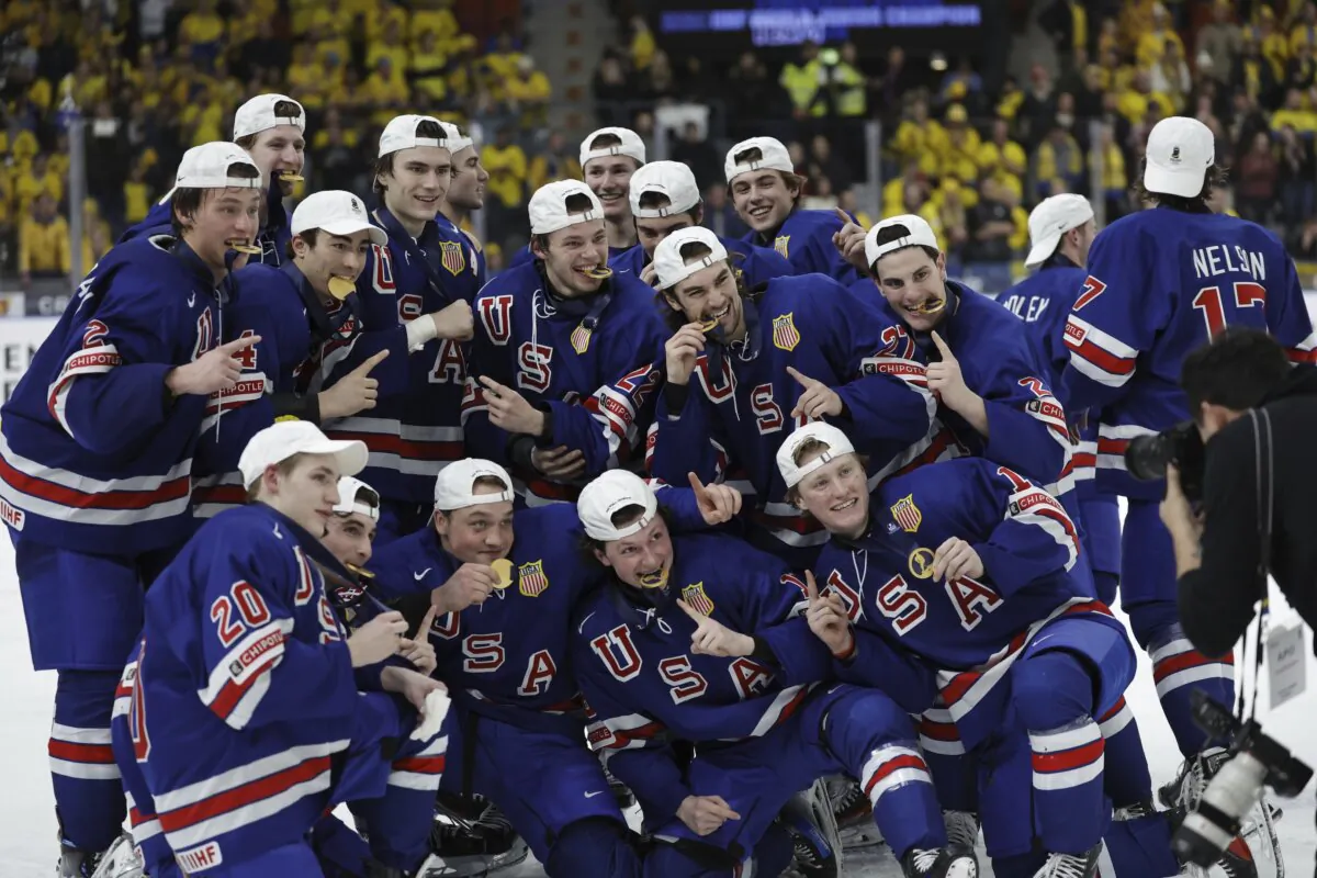 U.S. hockey players celebrate winning the IIHF World Junior Championship ice hockey final match between Sweden and USA at Scandinavium in Gothenburg, Sweden, on Jan. 5, 2024. (Bjorn Larsson Rosvall/TT via AP)