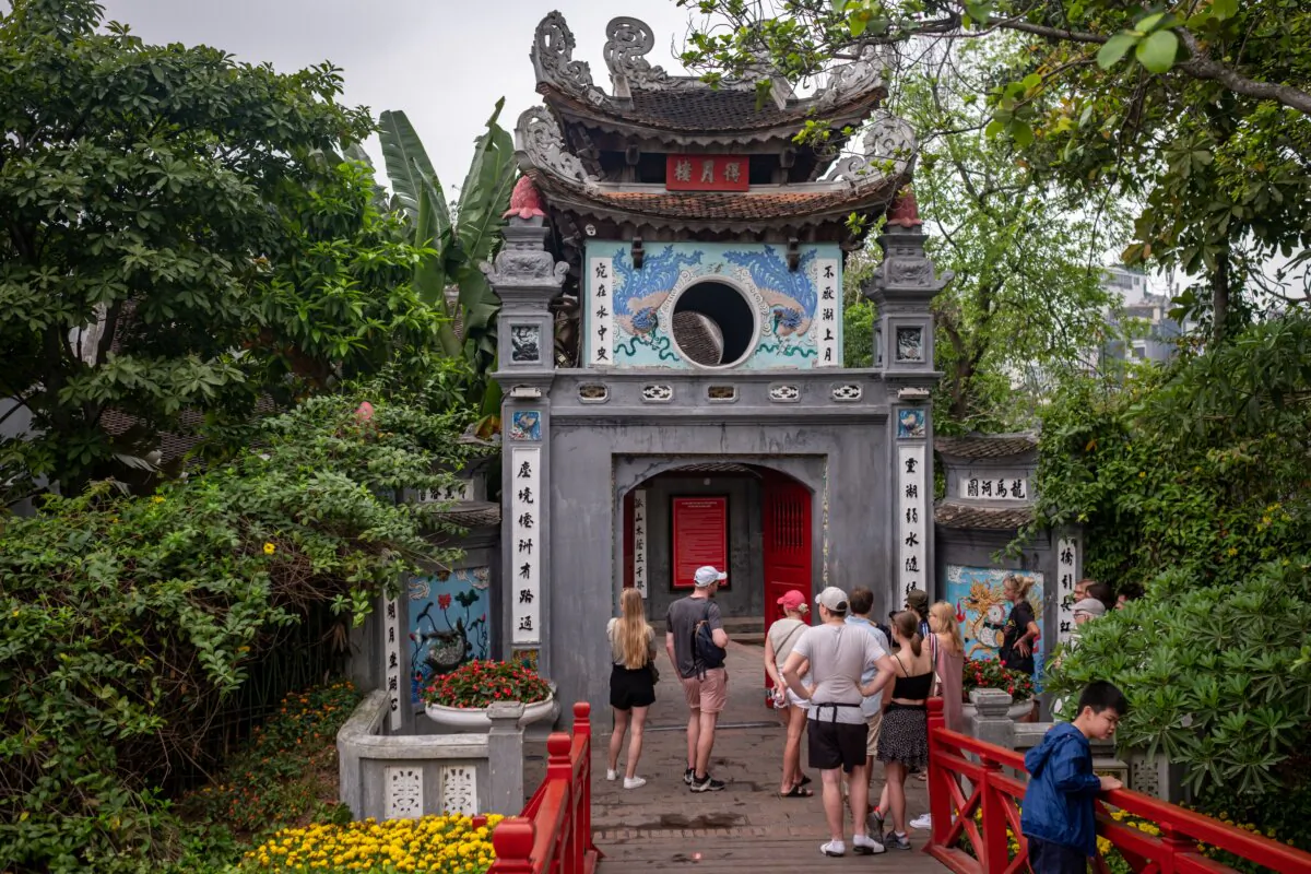 Tourists visit the Ngoc Son Temple on an island in Hoan Kiem Lake in Hanoi, Vietnam, on March 25, 2023. (Linh Pham/Getty Images)