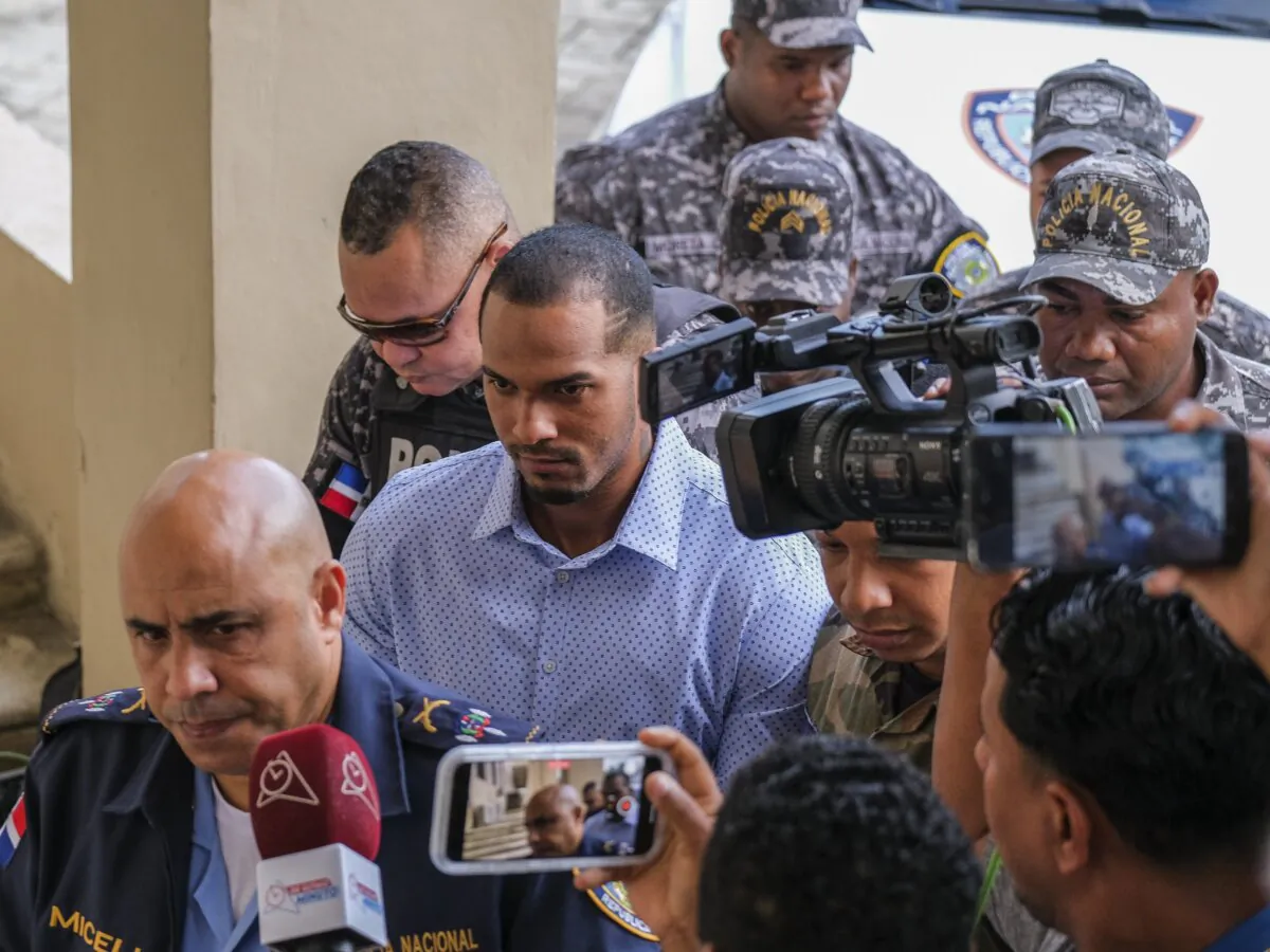 Tampa Bay Rays shortstop Wander Franco, center,  is escorted by police to court in Puerto Plata, Dominican Republic, on Jan. 5, 2024. (Ricardo Hernández/AP Photo)