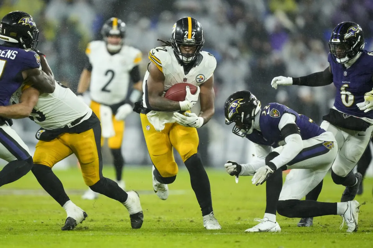 Pittsburgh Steelers running back Najee Harris (22) runs with the ball against the Baltimore Ravens during the second half of an NFL football game in Baltimore on Jan. 6, 2024. (Matt Rourke/AP Photo)