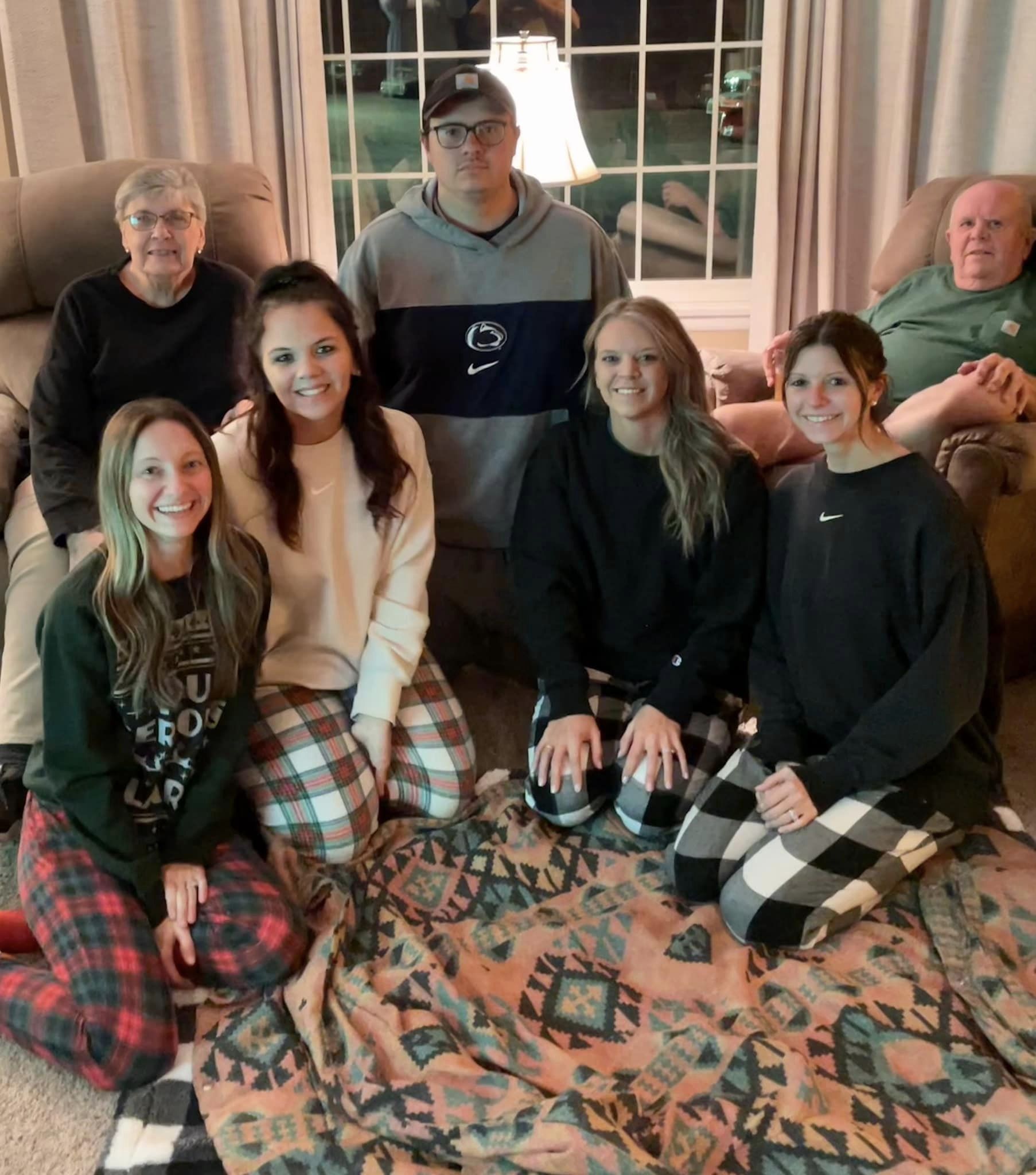 Linda and Ronald George with their five grandkids.