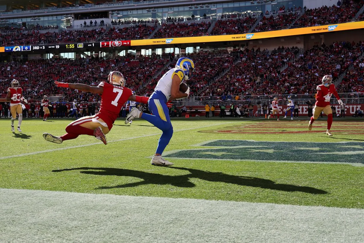 Puka Nacua (17) of the Los Angeles Rams catches a touchdown against Charvarius Ward (7) of the San Francisco 49ers in the first quarter during a game at Levi's Stadium in Santa Clara, Calif., on Jan. 7, 2024. (Ezra Shaw/Getty Images)