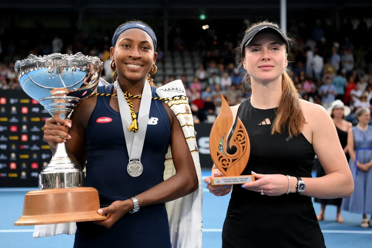 Coco Gauff of USA and Elina Svitolina of Ukraine pose with their trophies after playing in the Women's singles final match during the 2024 Women's ASB Classic in Auckland, New Zealand, on Jan. 7, 2024. (Hannah Peters/Getty Images)