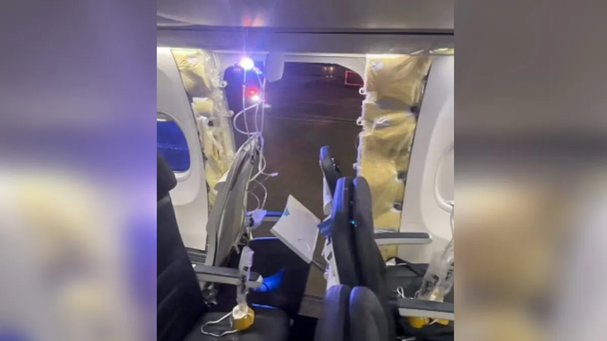 The damaged part of an Alaska Airlines Boeing 737 Max 9, Flight 1282, which was forced to return to Portland International Airport on Jan. 5, 2024. (The Oregonian via AP)