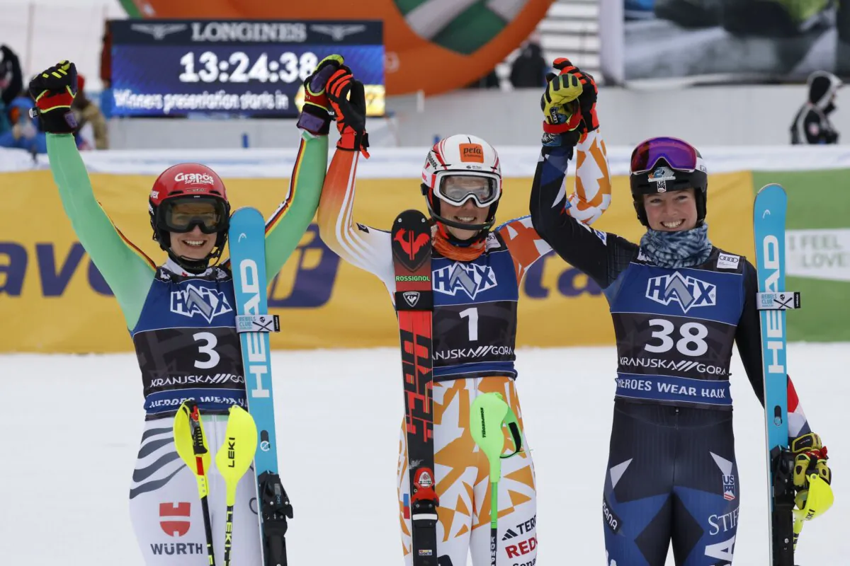Slovakia's Petra Vlhova (C), winner of an alpine ski, women's World Cup slalom race, celebrates with second-placed Germany's Lena Duerr (L) and third-placed from the U.S, a native of Truckee, Calif., A.J. Hurt, in Kranjska Gora, Slovenia on Jan. 7, 2024. (Giovanni Maria Pizzato/AP Photo)