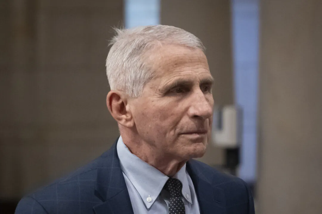Former Director of the National Institute of Allergy and Infectious Diseases (NIAID) Anthony Fauci goes back to a meeting where he is testifying before the Select Subcommittee on the Coronavirus Pandemic in Washington on Jan. 8, 2024. (Madalina Vasiliu/The Epoch Times)