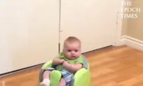 Cute Baby Rides a Robot Vacuum Cleaner