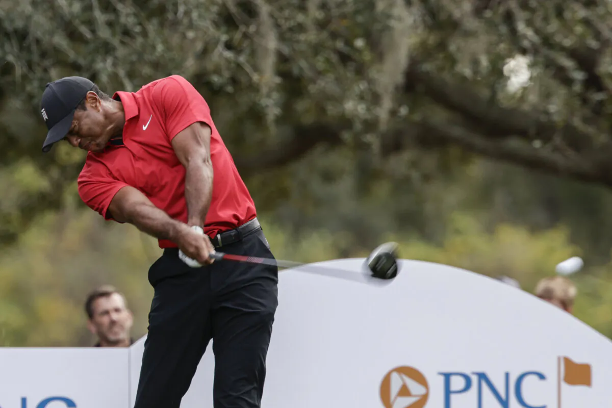Tiger Woods tees off on the 13th hole during the final round of the PNC Championship golf tournament in Orlando, Fla., on Dec. 17, 2023. (Kevin Kolczynski/AP Photo)