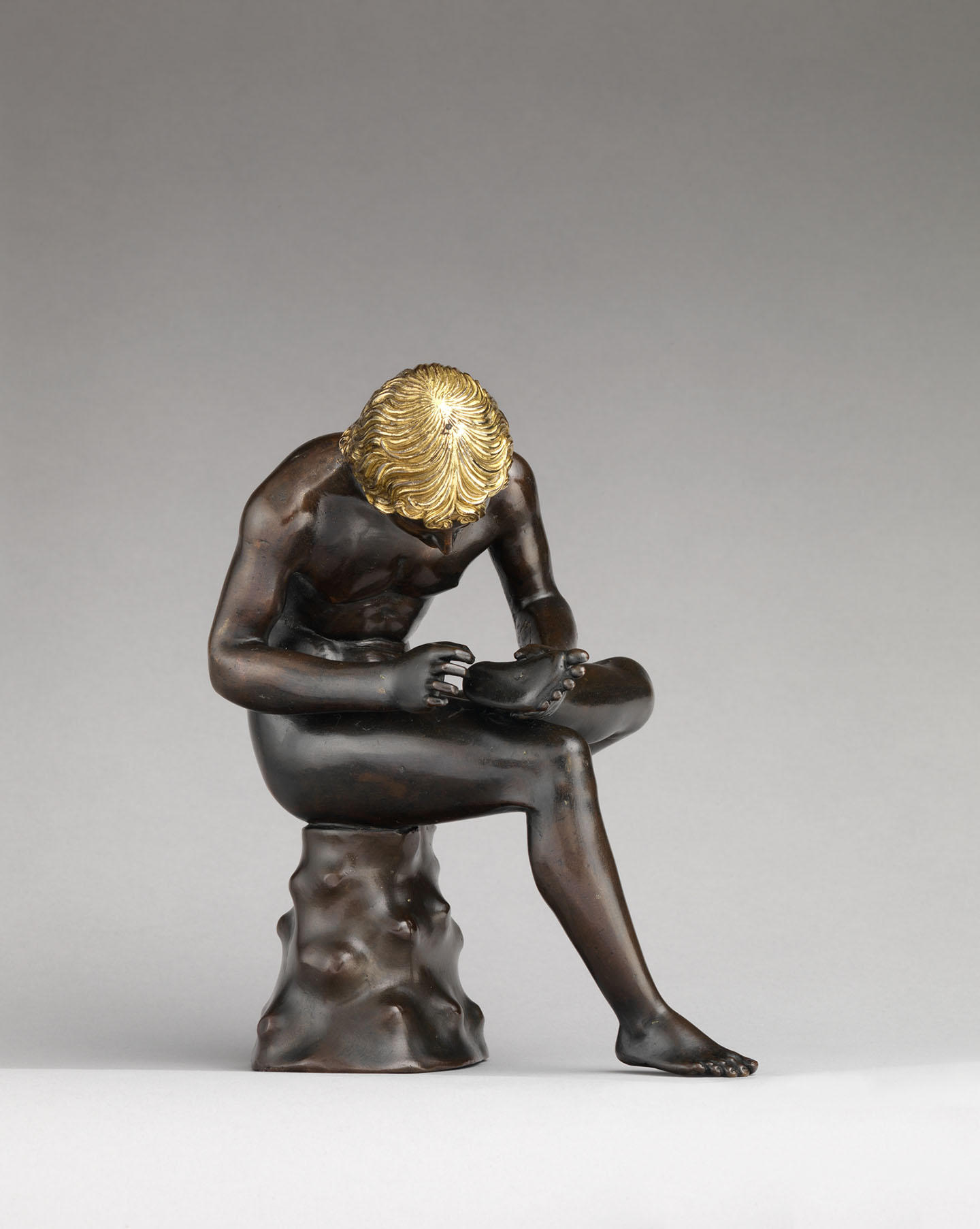 "Spinario (boy pulling a thorn from his foot)