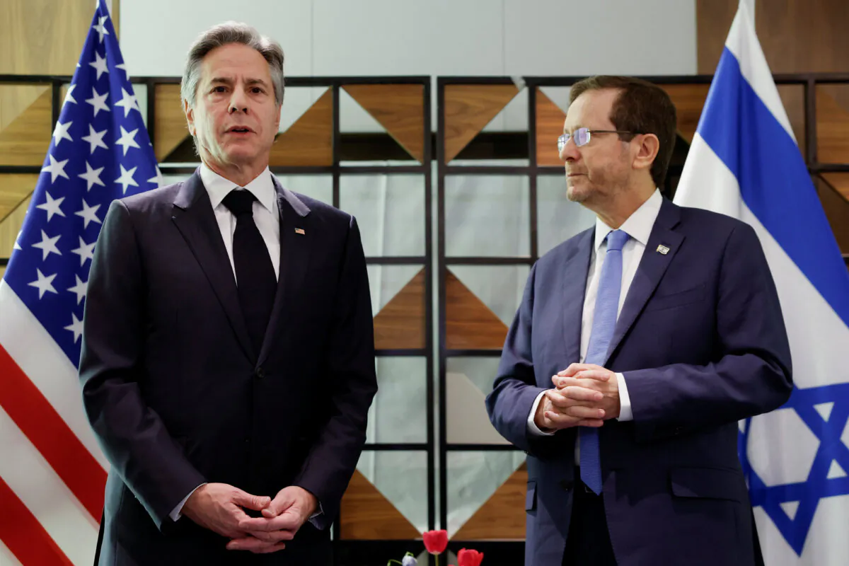 U.S. Secretary of State Antony Blinken meets Israel's President Isaac Herzog, during his week-long trip aimed at calming tensions across the Middle East, at David Kempinski Hotel, in Tel Aviv, Israel, January 9, 2024. REUTERS/Evelyn Hockstein/Pool