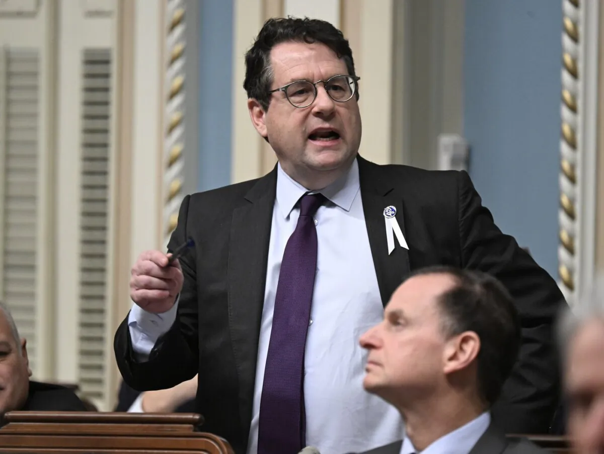 Quebec Education Minister Bernard Drainville responds to the opposition during question period at the legislature in Quebec City on Nov. 30, 2023. (The Canadian Press/Jacques Boissinot)