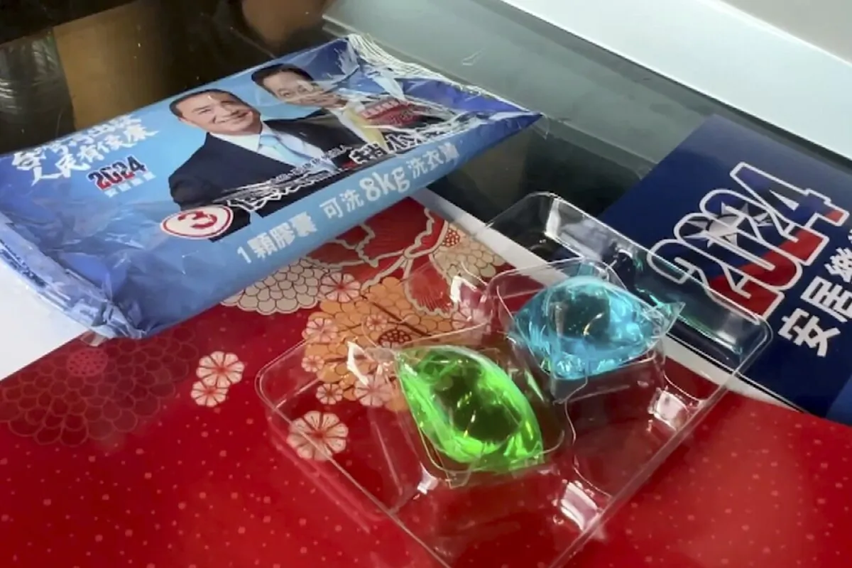 Liquid laundry detergent balls inside a package given by Nationalist Party (KMT) as a gift for supporter in Chunghwa, Central Taiwan, on Jan. 6, 2024. (TVBS via AP)
