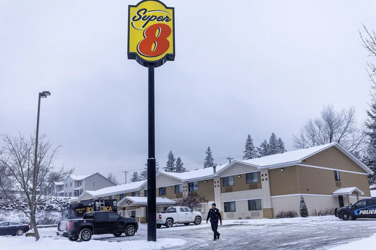 Police and the BCA at the scene where two people were shot and killed Monday night at a Super 8 hotel in Cloquet, Minn., on Jan. 9, 2024. (Elizabeth Flores/Star Tribune via AP)