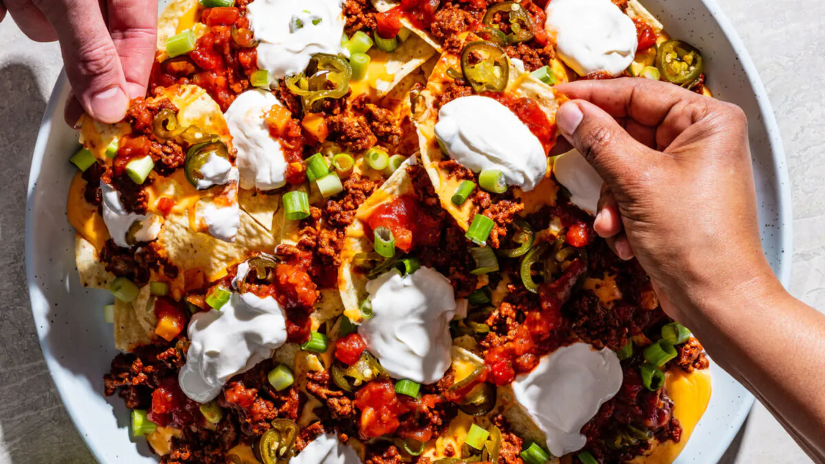 You don’t even need to leave the house to have delicious nachos. (Steve Klise/TNS)
