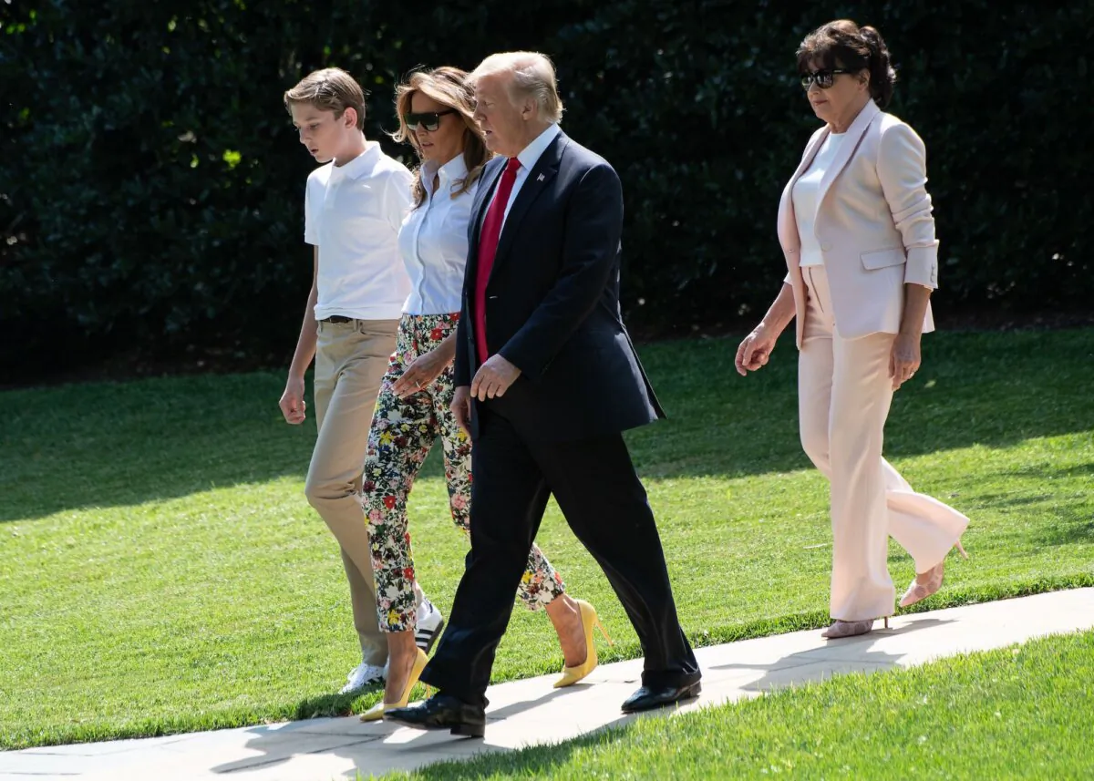 U.S. President Donald Trump (2nd L), First Lady Melania Trump (2nd R), their son Barron and Melania Trump's mother Amalija Knavs walk to board Marine One at the White House in Washington, DC, on June 29, 2018. (Nicholas Kamm/AFP via Getty Images)