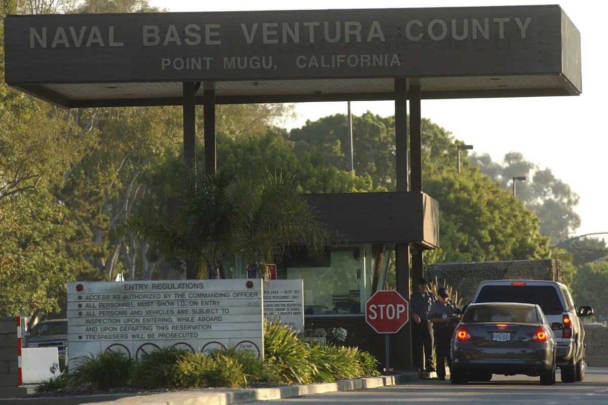 Cars enter Naval Base Ventura County in Ventura County, Calif., on Aug. 25, 2005. (Dave Getzschman/The Ventura County Star via AP)