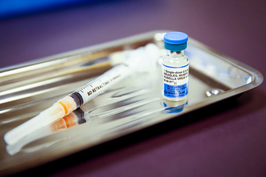 A vial of the measles, mumps, and rubella (MMR) vaccine at the International Community Health Services clinic in Seattle on March 20, 2019. (Lindsey Wasson/Reuters)