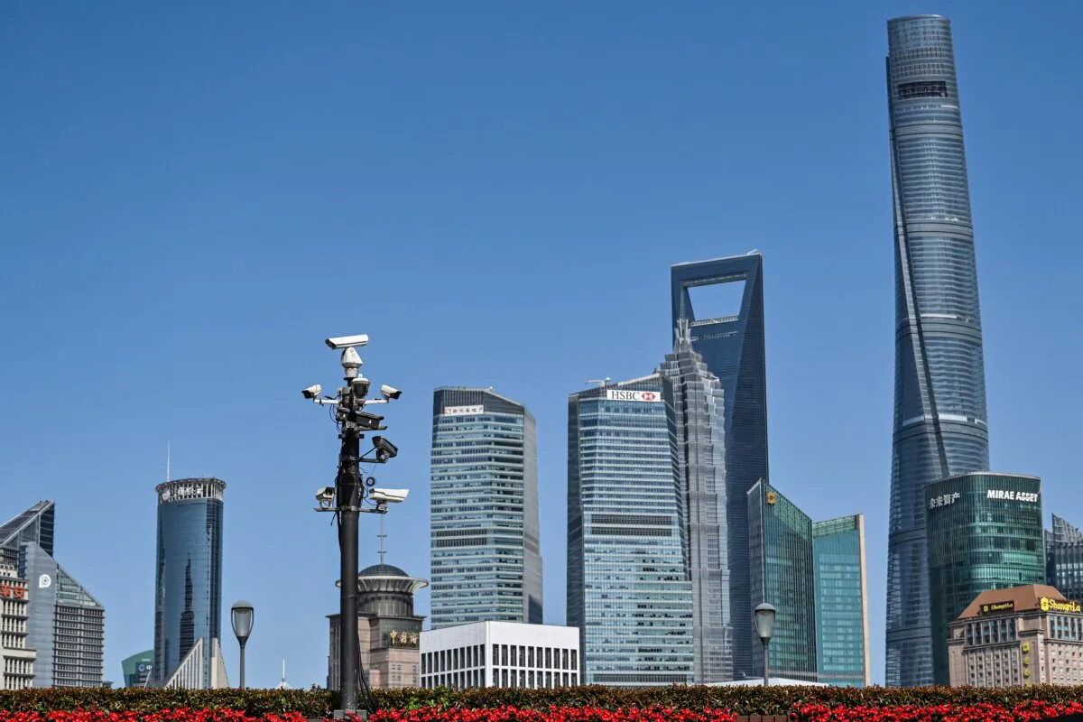 A tower of security cameras (centre L) are seen on The Bund past the Lujiazui financial district in the background, in Shanghai on May 23, 2023. (Hector Retamal/ AFP via Getty Images)