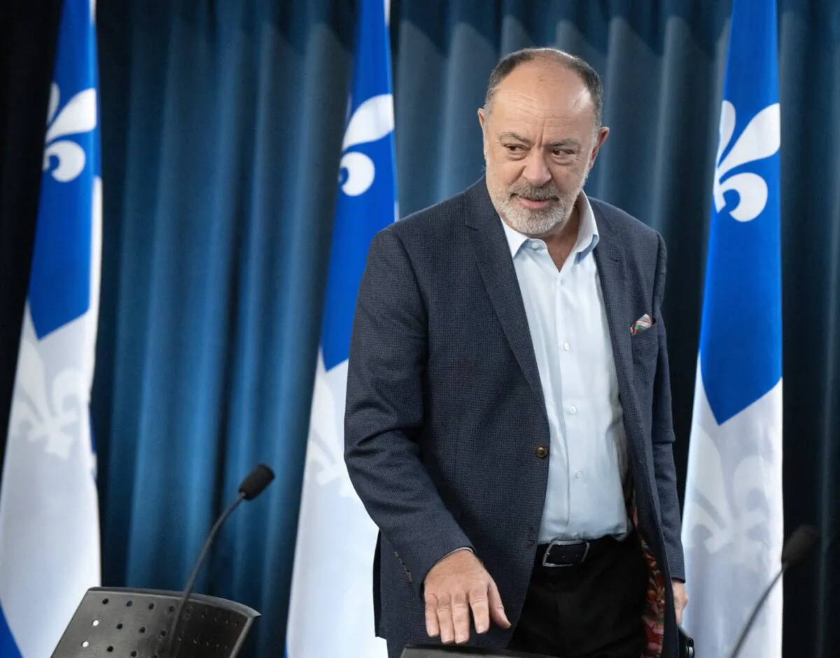 Quebec's Health Minister Christian Dubé arrives to update the vaccination and emergency room situation during a press briefing in Montreal, on Dec. 19, 2023. (The Canadian Press/Ryan Remiorz)