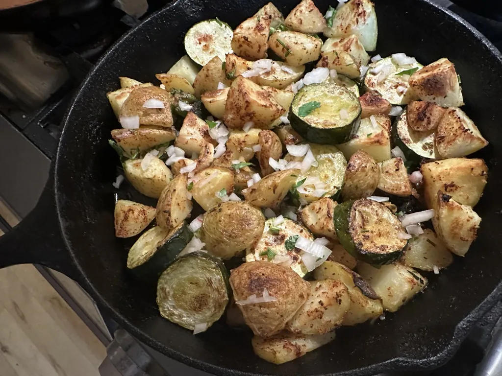 Boiling potatoes in baking soda water before baking them creates a tater-tot effect, with puffy interiors encased in delectable golden skins. (Ari LeVaux)