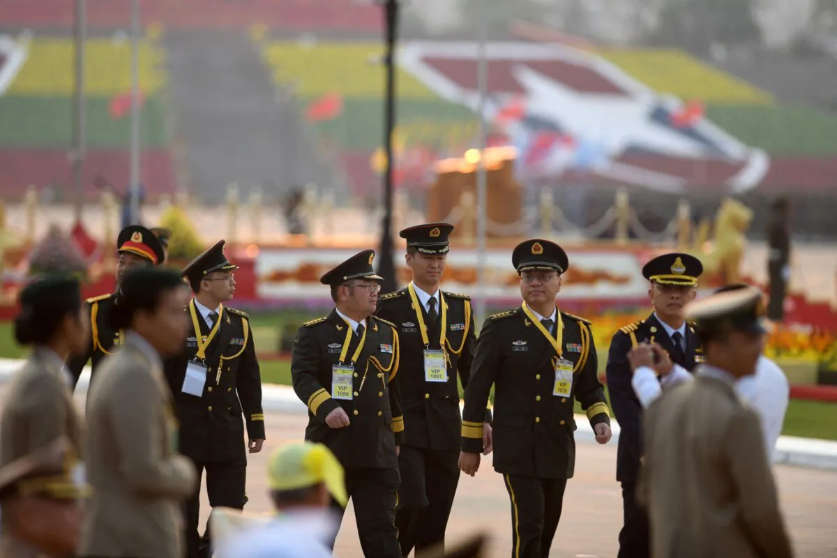 Chinese military officers attend a ceremony to mark Burma's 78th Armed Forces Day in Naypyidaw, Burma, on March 27, 2023. (STR/AFP via Getty Images)