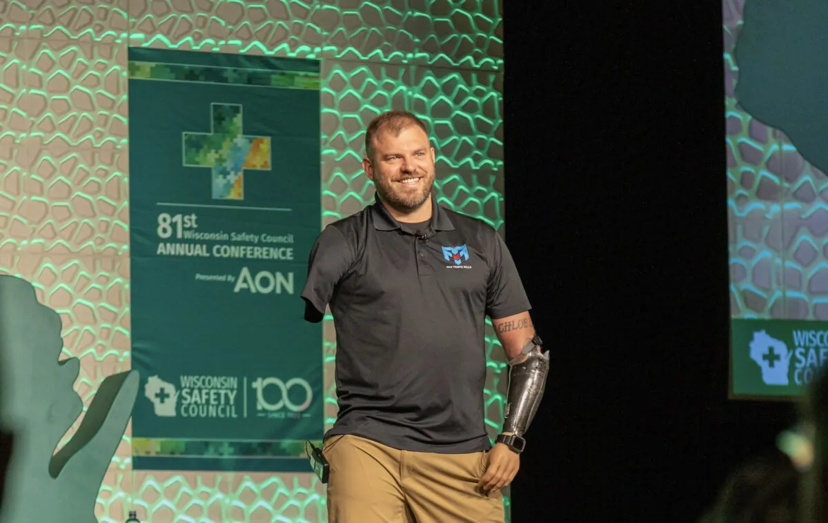 Mr. Travis Mills speaks at a company event in Wisconsin, April 2023. (Courtesy of Travis Mills)