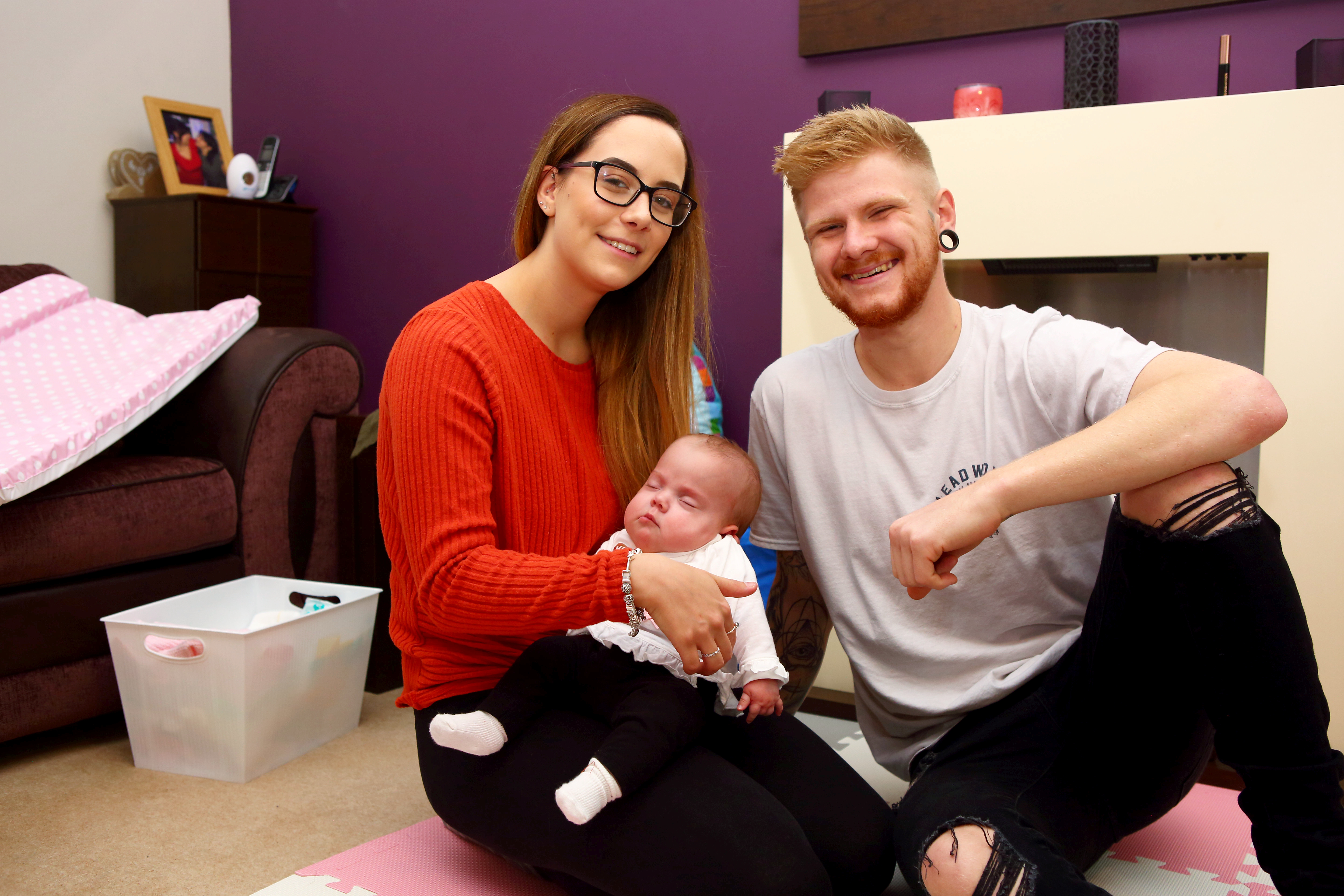 Piper with her parents.