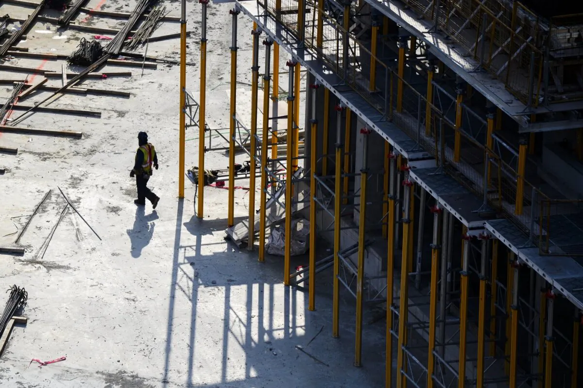 A construction worker is shown at a building site in Ajax, Ont., on Nov., 30, 2023. (The Canadian Press/Christopher Katsarov)