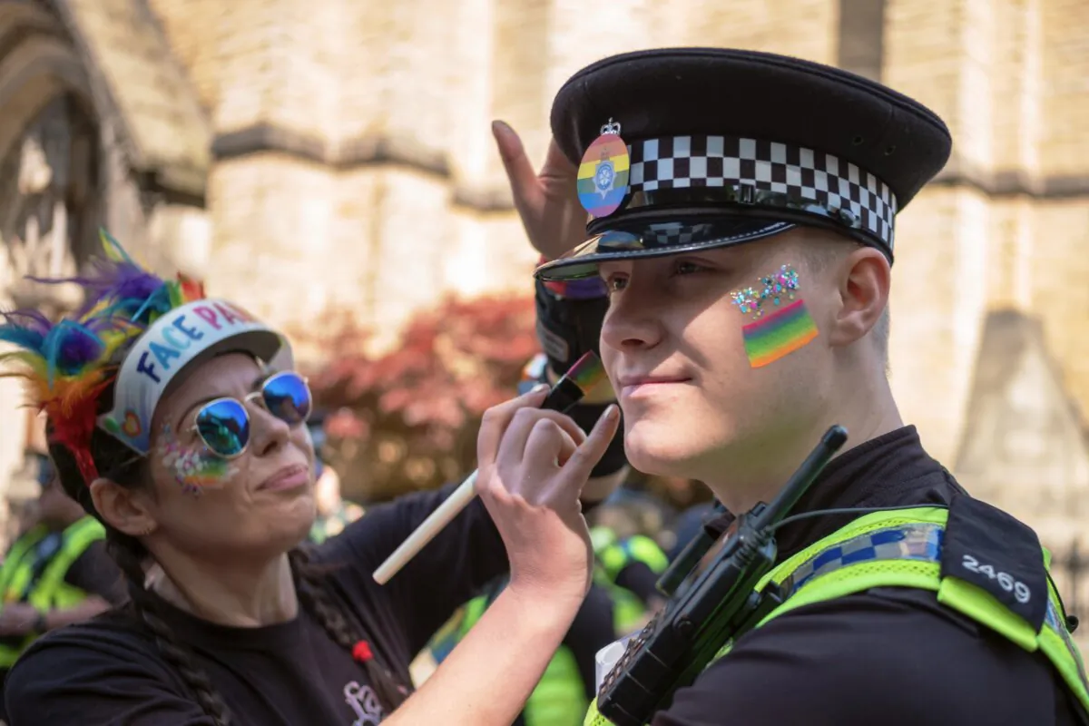 A police officer has his face painted during the York Pride parade in York, England, on June 3, 2023. (Ian Forsyth/Getty Images)