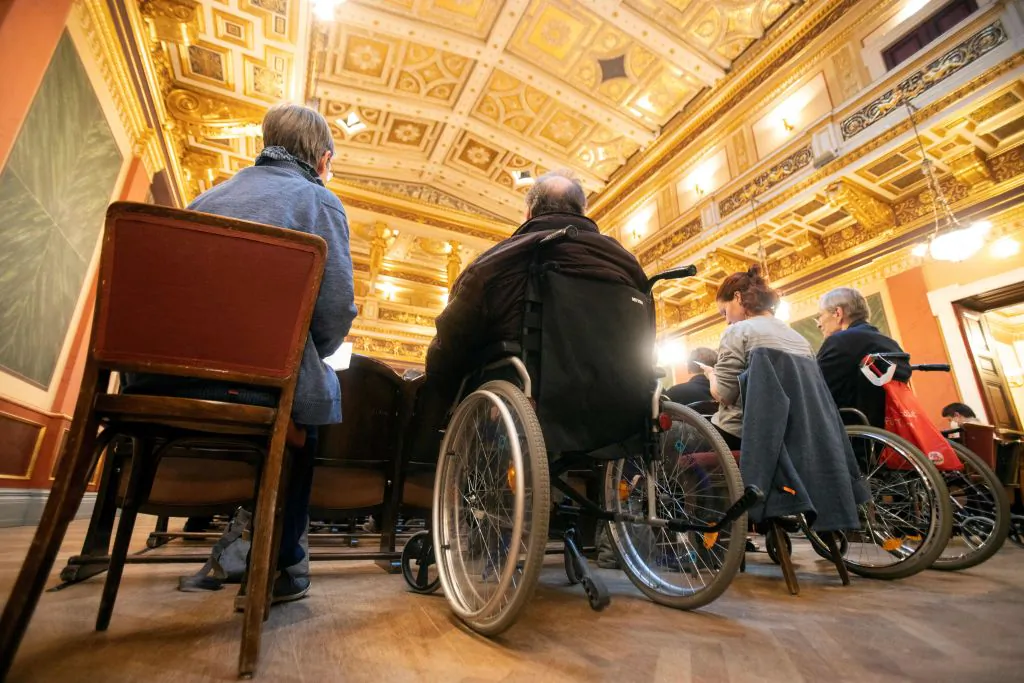 Spectators in wheelchairs attend a concert specifically tailored to people living with dementia at the Wiener Musikverein in Vienna on Dec. 5, 2022. (Alex Halada/AFP via Getty Images)