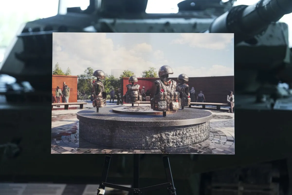 An artist rendering of the new national monument to Canada's mission in Afghanistan is pictured during an announcement at the Canadian War Museum in Ottawa on June 19, 2023. (The Canadian Press/Sean Kilpatrick)